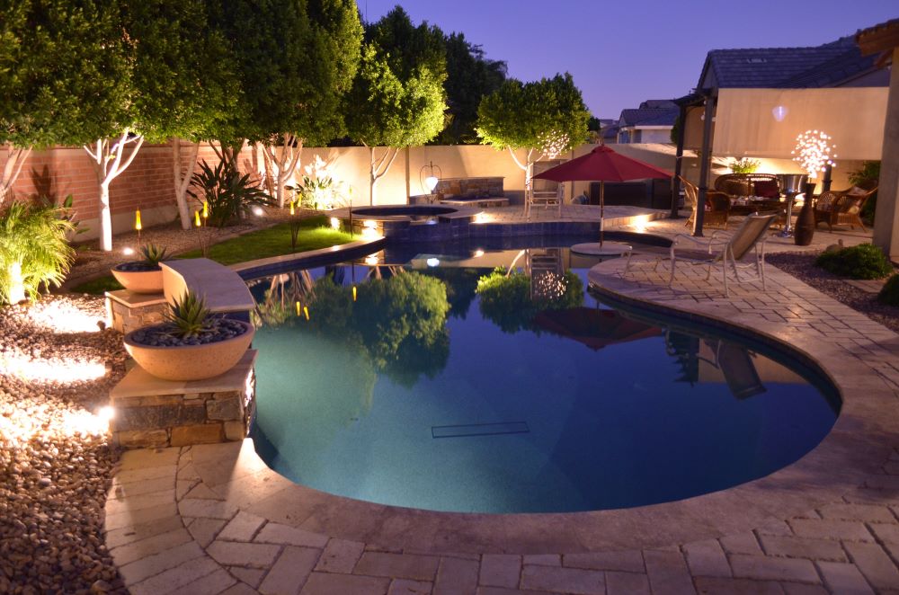 Custom Saturn Pools swimming pool and patio on a clear Phoenix winter afternoon